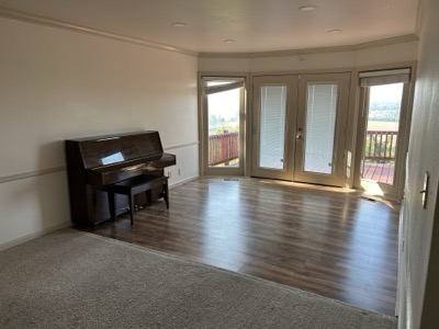 Clean living room with hardwood floors